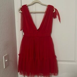 I am selling this dress, red color, size M.